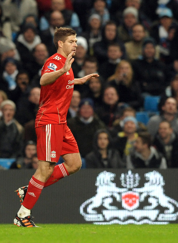 Liverpool's English Midfielder Steven Gerrard Celebrates