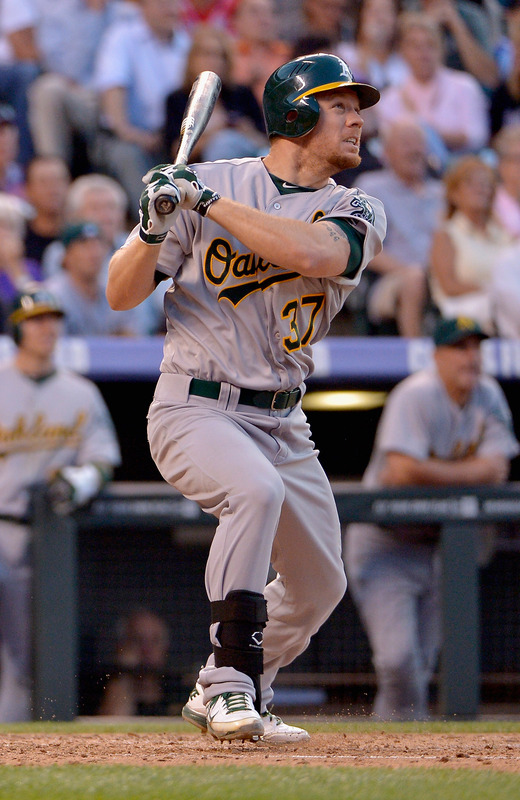   Brandon Moss #37 Of The Oakland Athletics Watches His Two Run Home Run Off Of Starting Pitcher Jeremy Guthrie #15 Of