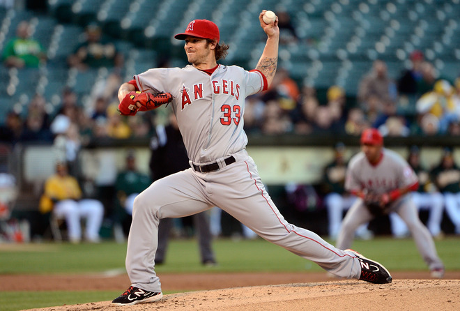   C.J. Wilson #33 Of The Los Angeles Angels Of Anaheim Pitches