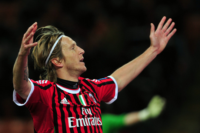 AC Milan's Midfielder And Captain Massimo Ambrosini Gesticulates