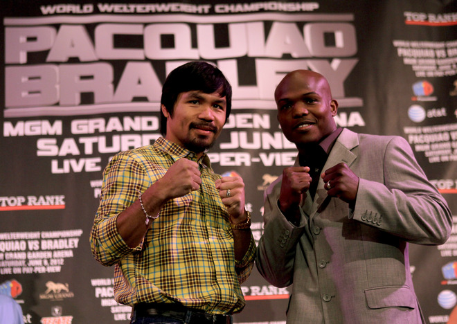   Manny Pacquiao (L) And Timothy Bradley Pose Fpr Photographers