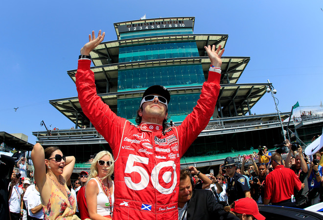 wife of the late Dan Wheldon look on during the IZOD IndyCar Series 96th