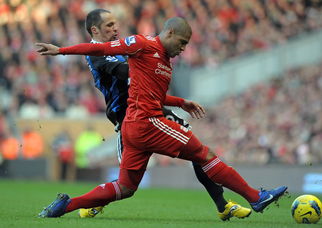 Liverpool's English Defender Glen Johnson (R) Vies With Stoke City's English Midfielder Matthew Etherington (L) 