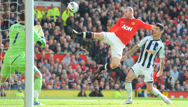 Manchester United's English Forward Wayne Rooney  (C) Wins A Ball From West Bromwich Albion's English Defender Liam