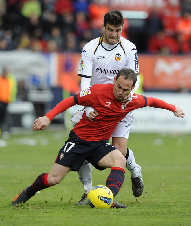 Valencia's Defender Antonio Barragan (Up) Vies