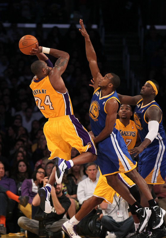   Kobe Bryant #24 Of The Los Angeles Lakers Shoots