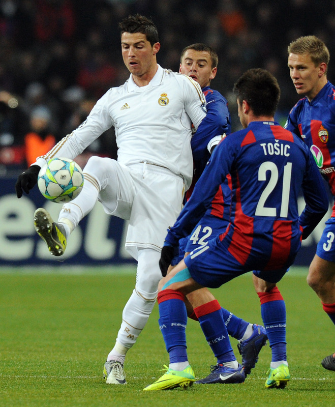 Cristiano Ronaldo (L) Of Real Madrid Fights