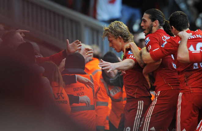 Liverpool's Dutch Striker Dirk Kuyt (L) Celebrates Scoring Their Winning Goal With Team-mates   RESTRICTED TO EDITORIAL
