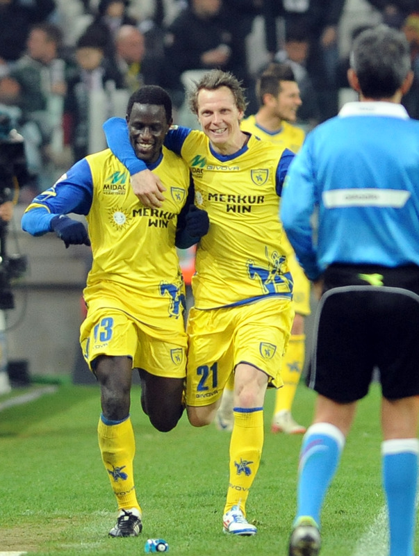 Chievo's French Defender Boukary Drame (L) Celebrates