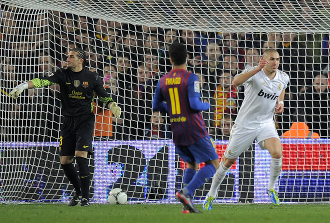 Real Madrid's French Forward Karim Benzema (R) Celebrates