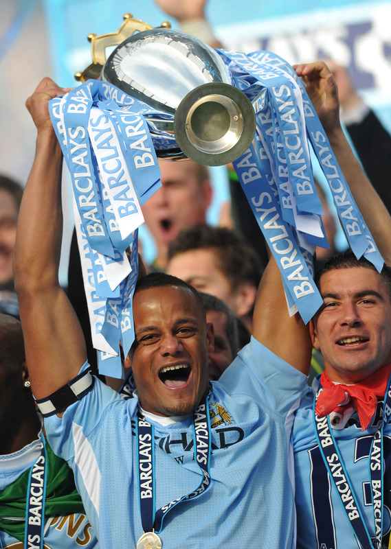 Manchester City's Belgian Captain Vincent Kompany Lifts The Premier League Trophy 

RESTRICTED TO EDITORIAL USE. No Use