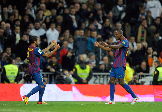 Barcelona's French Defender Eric Abidal (R) Celebrates