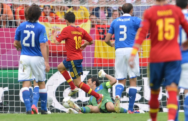 Spanish Forward Cesc Fabregas (2ndL) Reacts