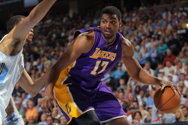  Andrew Bynum #17 Of The Los Angeles Lakers Dribbles