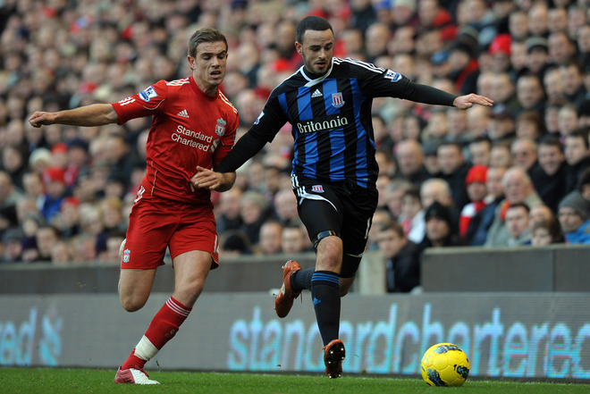 Liverpool's English Midfielder Jordan Henderson (L) Vies With Stoke City's Northern Irish Midfielder Marc Wilson (R) 