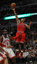 CHICAGO, IL - MARCH 12: Derrick Rose #1 of the Chicago Bulls shoots over Amar'e Stoudemire #1 of the New York Knicks at the United Center on March 12, 2012 in Chicago, Illinois. The Bulls defeated the Knicks 104-99. NOTE TO USER: User expressly acknowledges and agrees that, by downloading and or using this photograph, User is consenting to the terms and conditions of the Getty Images License Agreement. (Photo by Jonathan Daniel/Getty Images)
