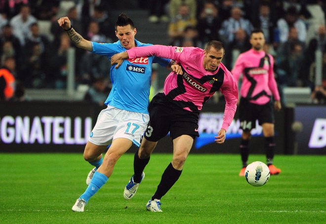 Juventus' Defender Giorgio Chiellini (R) Fights