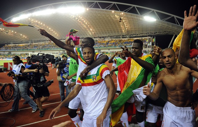 Mali's Seydou Keita (Bottom C) And Teammates