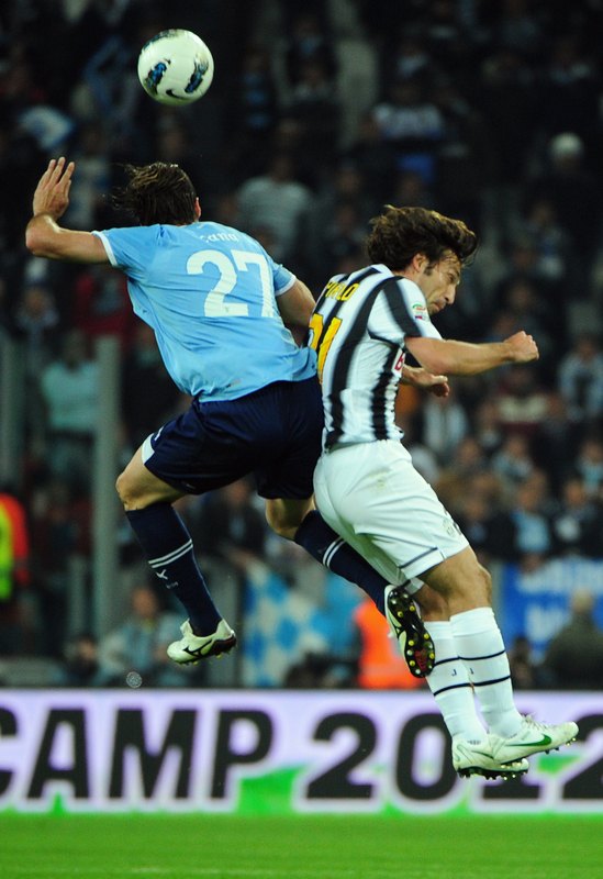 Juventus' Midfielder Andrea Pirlo (R) Fights