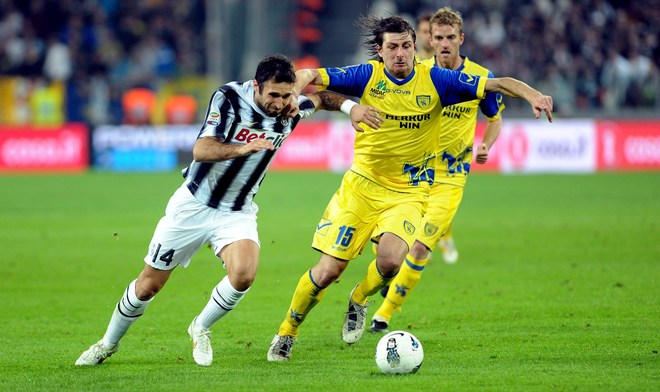 Chievo's Defender Francesco Acerbi (R) Vies