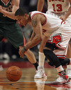 CHICAGO, IL - FEBRUARY 22: Derrick Rose #1 of the Chicago Bulls chases down a loose ball against the Milwaukee Bucks at the United Center on February 22, 2012 in Chicago, Illinois. The Bulls defeated the Bucks 110-91. NOTE TO USER: User expressly acknowledges and agrees that, by downloading and or using this photograph, User is consenting to the terms and conditions of the Getty Images License Agreement. (Photo by Jonathan Daniel/Getty Images)