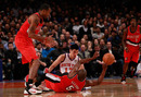 NEW YORK, NY - MARCH 14: (C) Jeremy Lin #17 of the New York Knicks battles for a loose ball foul with Marcus Camby #23 of the Portland Trail Blazers and Raymond Felton #5 of the Portland Trail Blazers  at Madison Square Garden on March 14, 2012 in New York City. NOTE TO USER: User expressly acknowledges and agrees that, by downloading and/or using this Photograph, user is consenting to the terms and conditions of the Getty Images License Agreement.  (Photo by Chris Trotman/Getty Images)