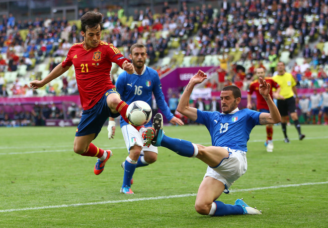   David Silva Of Spain And Leonardo Bonucci Of Italy Compete For The Ball