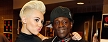 Miley Cyrus  and rapper Flavor Flav  (Isaac Brekken/Getty Images for Clear Channel)