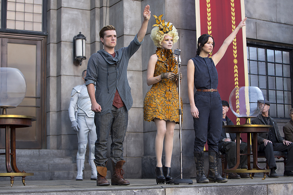 Click to enlarge. Jennifer Lawrence, Josh Hutcherson, and Elizabeth Banks in &#39;The Hunger Games: Catching Fire&#39; (Lionsgate)