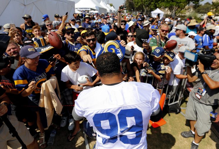 Defensive tackle Aaron Donald signs autographs for Los Angeles Rams fans (AP)