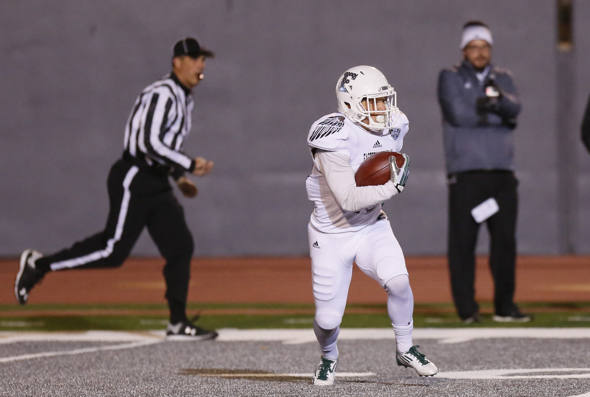 Eastern Michigan's Blake Banham returns a kickoff against Western Michigan during the first half of an NCAA football game Thursday, Oct. 29, 2015, in Ypsilanti, Mich. (AP Photo/Duane Burleson)
