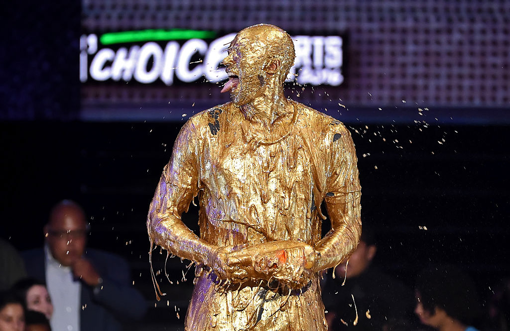 Kobe Bryant chances getting gold slime on his tongue. (Kevin Winter/Getty Images)