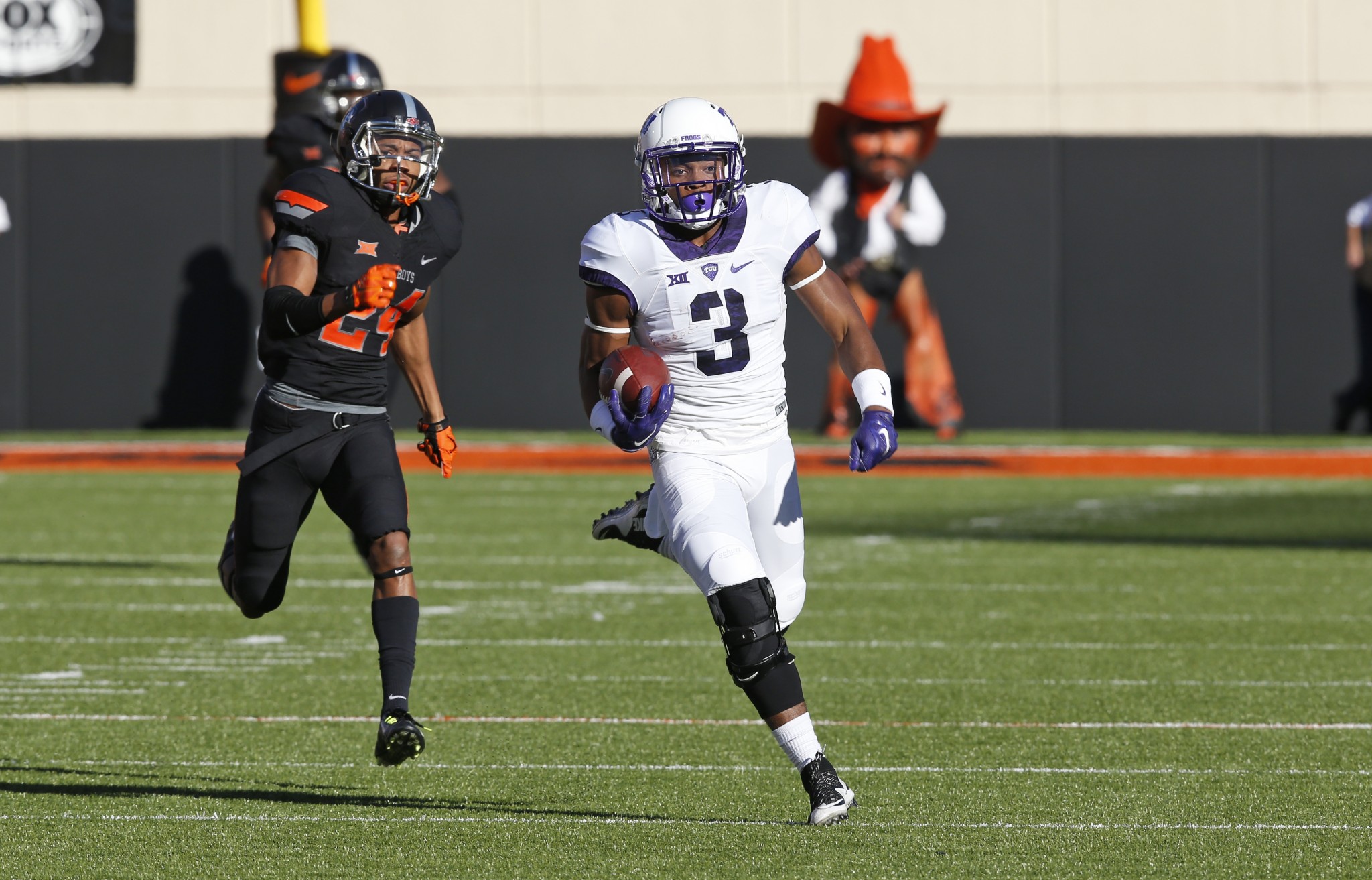 TCU running back Shaun Nixon (3) carries during an NCAA college football game between TCU and Oklahoma State in Stillwater, Okla., Saturday, Nov. 7, 2015. Oklahoma State won 49-29. (AP Photo/Sue Ogrocki)