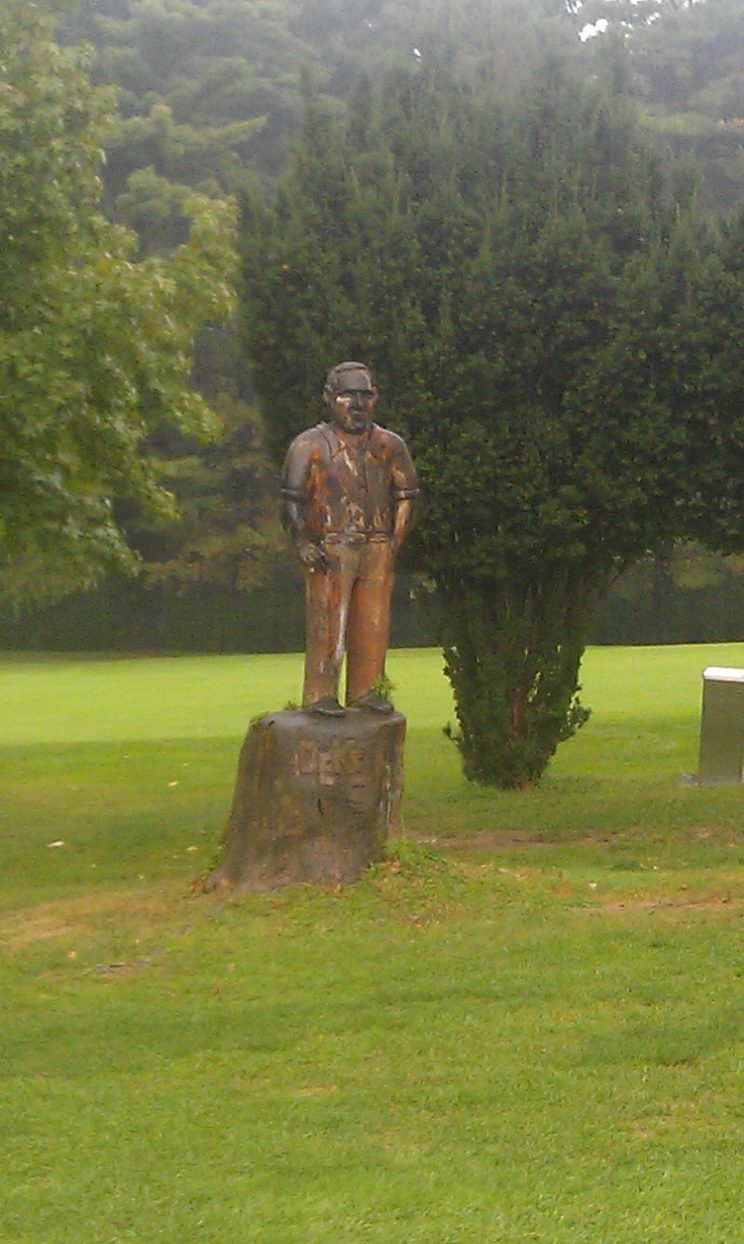 A wooden statue of Deacon Palmer at Latrobe Country Club. (Ryan Ballengee)