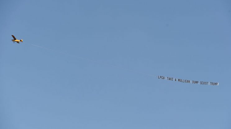 From March: A plane protests the USGA's decision to hold the Women's Open at a Trump course. (Getty)