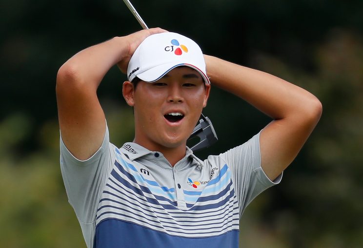 Si Woo Kim of South Korea reacts after nearly making his birdie putt on the ninth green during the second round of the Wyndham Championship. (Getty Images)