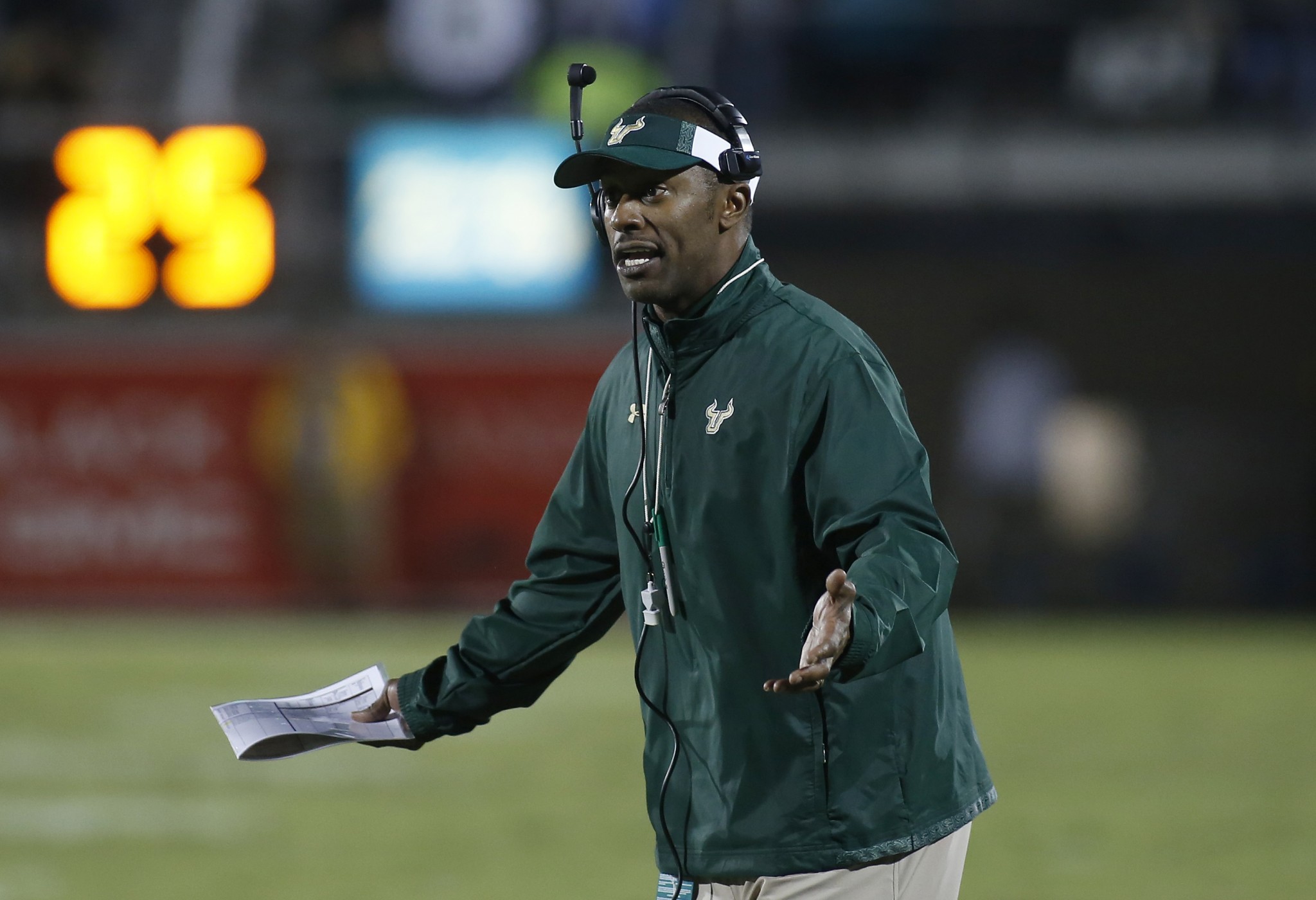 South Florida head coach Willie Taggart yells at the referee. (AP Photo/Reinhold Matay)