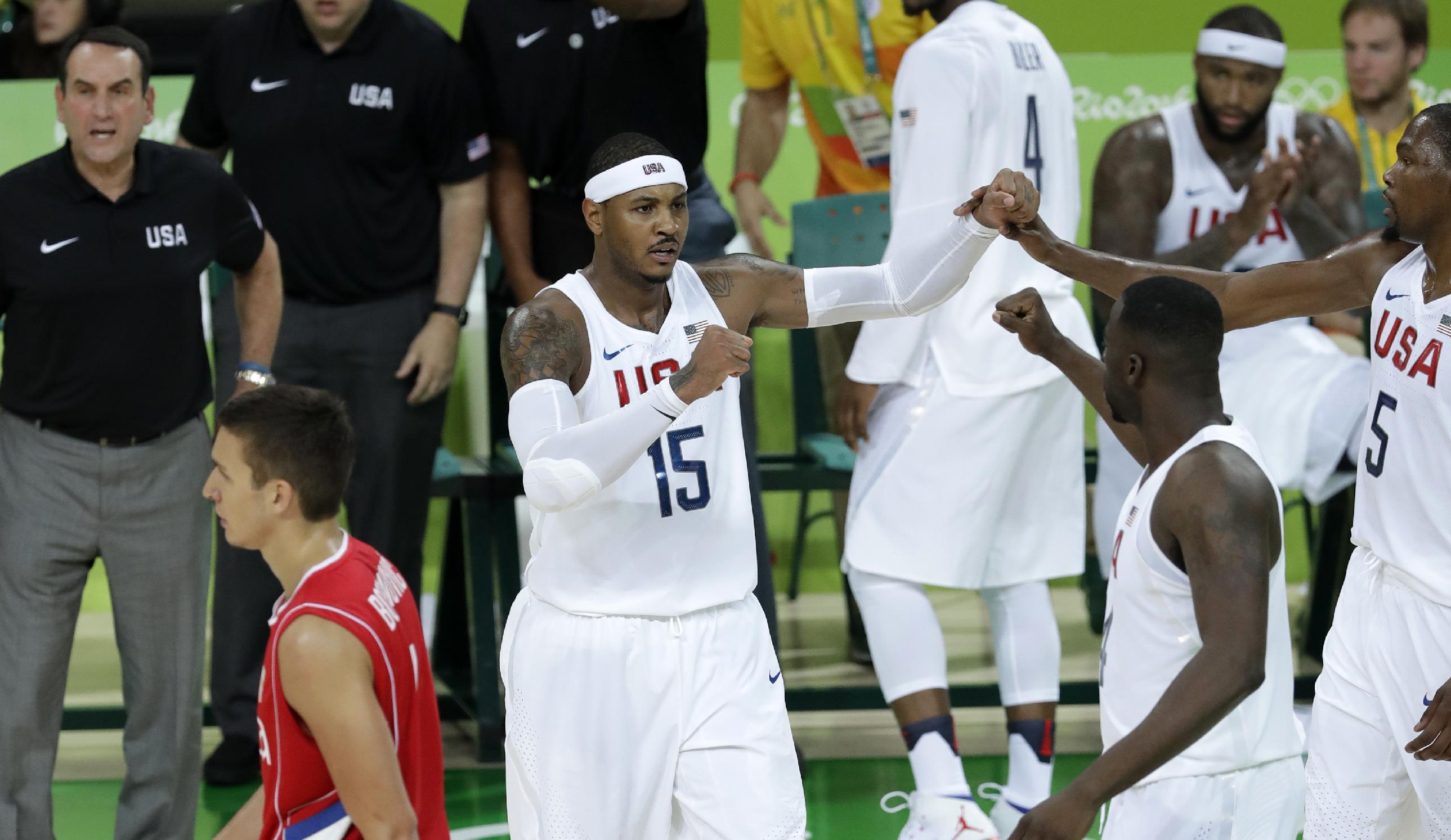 Carmelo Anthony and Team USA survived a scare against Serbia. (AP)