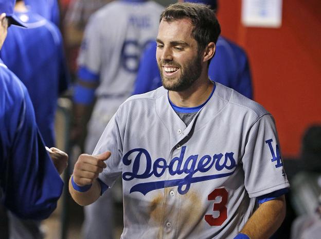 Chris Taylor celebrates his big game as the Dodgers beat the Diamondbacks in Arizona. (AP)