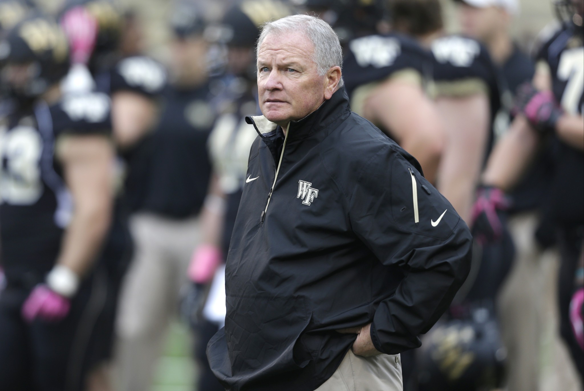 Wake Forest head coach Jim Grobe looks on before an NCAA college football game against Maryland in Winston-Salem, N.C., Saturday, Oct. 19, 2013. (AP Photo/Chuck Burton)