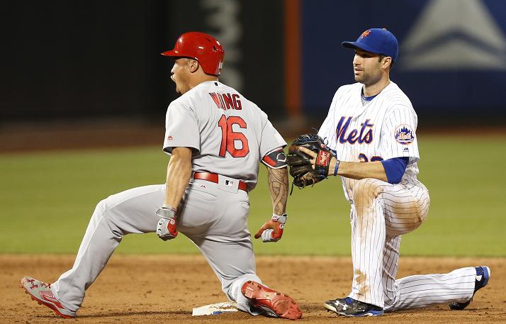 Kolten Wong celebrates his clutch go-ahead double against the Mets. (AP)