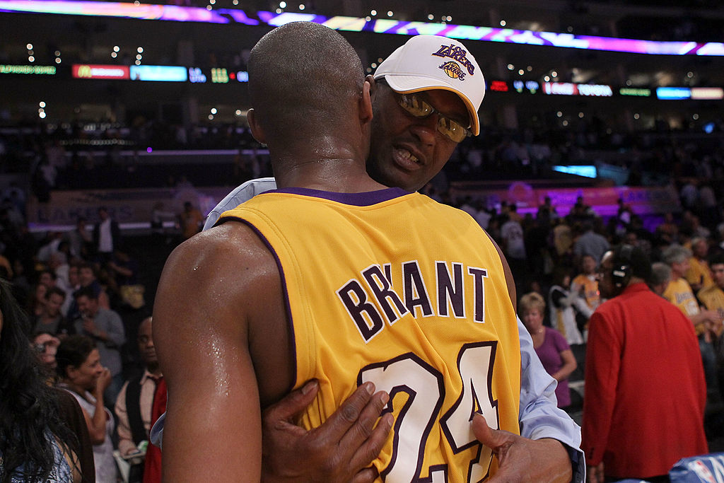 Joe Bryant hugs his son Kobe Bryant after the Lakers beat the Jazz in Game 2 of the 2010 Western Conference Semifinals. (Stephen Dunn/Getty Images)