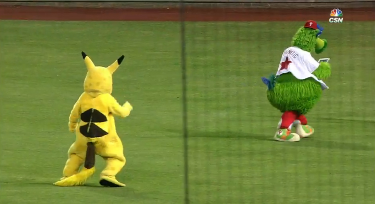 The Phillie Phanatic searches for Pokemon between innings during the Philadelphia Phillies vs Miami Marlins on July 19, 2016.