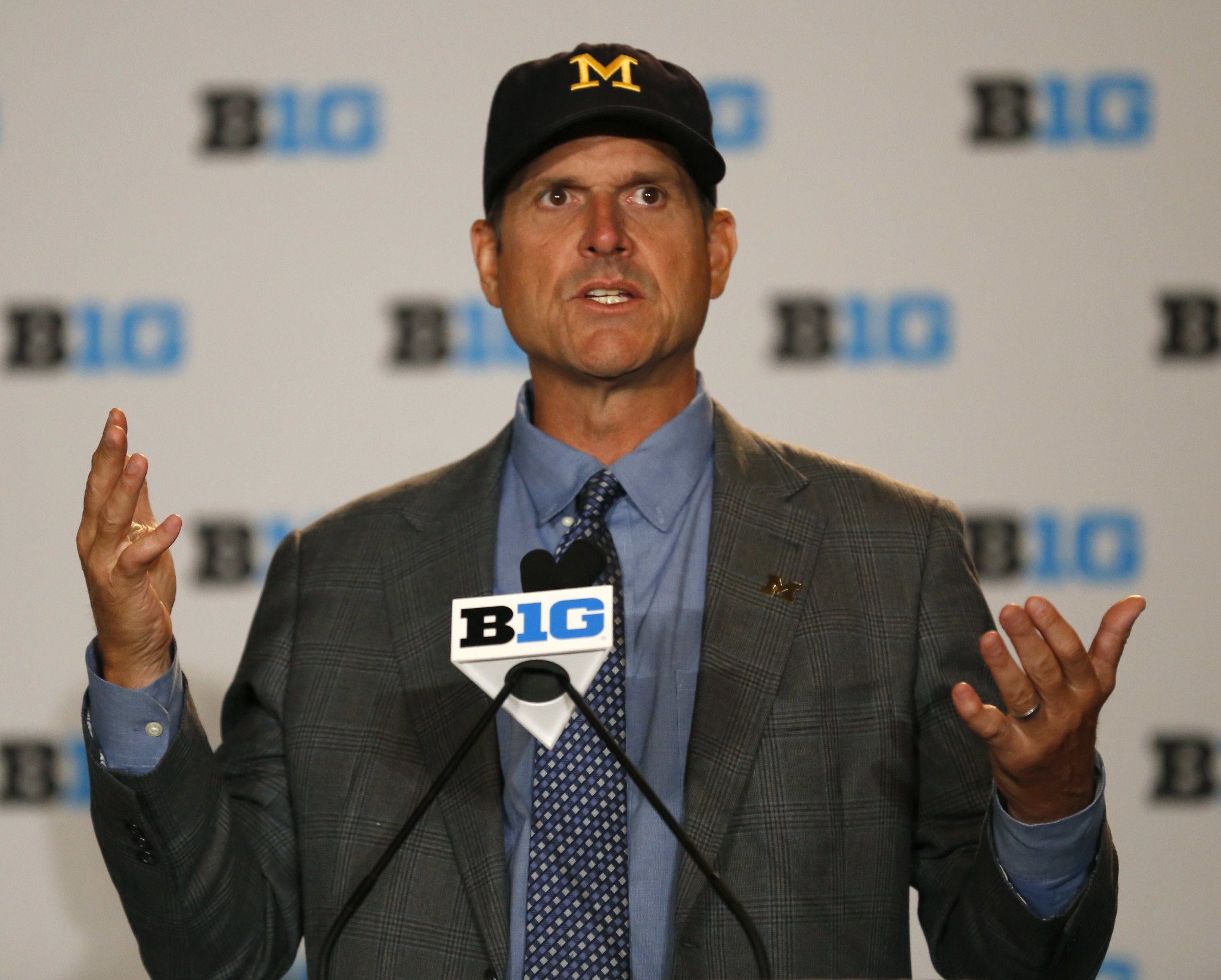 Michigan head coach Jim Harbaugh speaks to the media at the Big Ten NCAA college football media days, Monday, July 25, 2016 in Chicago. (AP Photo/Tae-Gyun Kim)