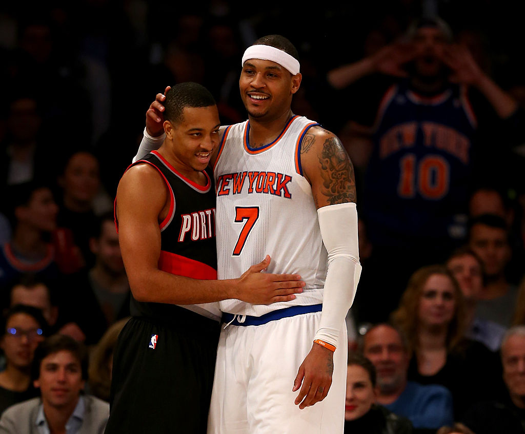 Carmelo Anthony makes sure C.J. McCollum know he cares in 2016. (Elsa/Getty Images)