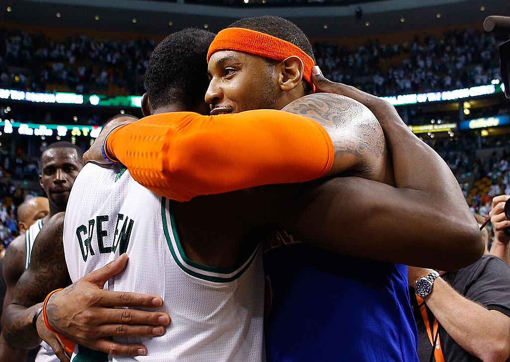 Carmelo Anthony enjoys the company of Jeff Green in 2013. (Jim Rogash/Getty Images)