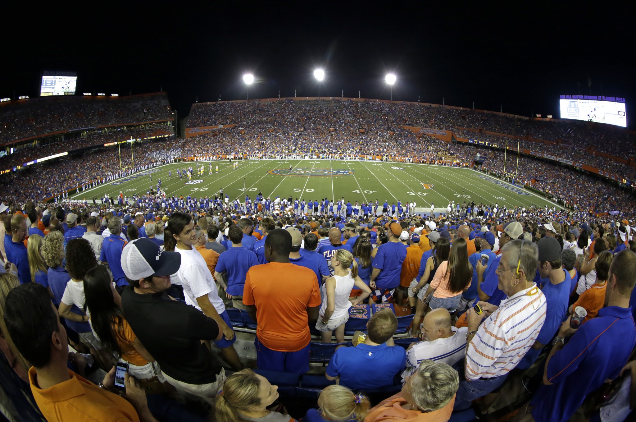 Fans watch an NCAA college football game at Ben Hill Griffin Stadium at Florida Field between Florida and LSU in Gainesville, Fla., Saturday, Oct. 11, 2014. (AP Photo/John Raoux)