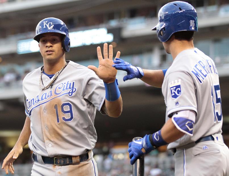 Cheslor Cuthbert (left) and Whit Merrifield (right) are two big reasons the Royals are still relevant. (AP)