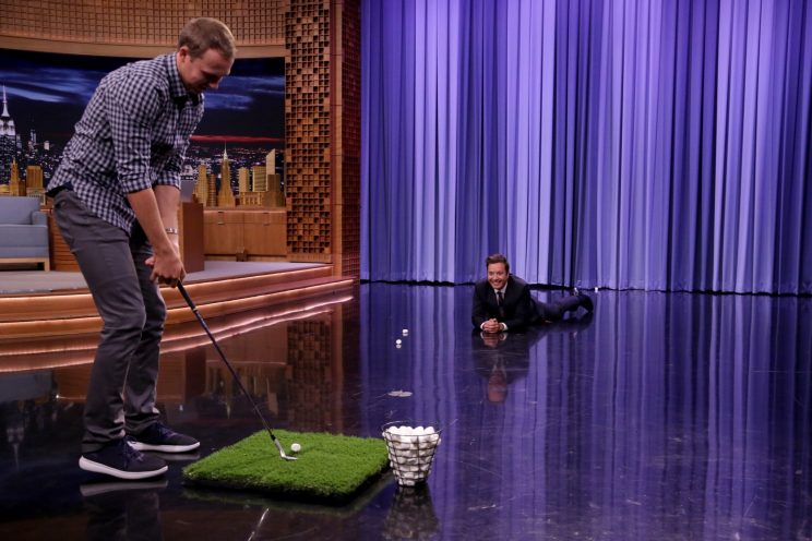 Jordan Spieth tried getting marshmallows in Jimmy Fallon's mouth. (Getty Images)