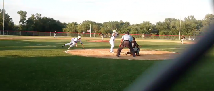 High school player Graham Tews went between his teammate's legs on this steal of home. (@DrewEich14 Screenshot)
